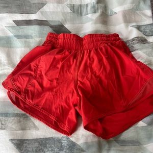 Red Lululemon 4” Hotty Hot shorts in size 0